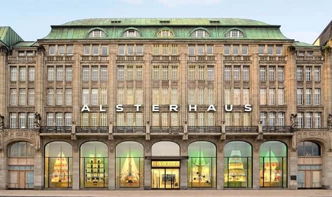 Opening of the Louis Vuitton store in the Residenzstrasse. Customers admire  bags Stock Photo - Alamy